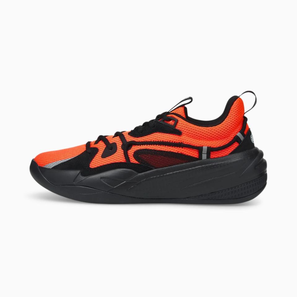 Orange and black basketball shoe