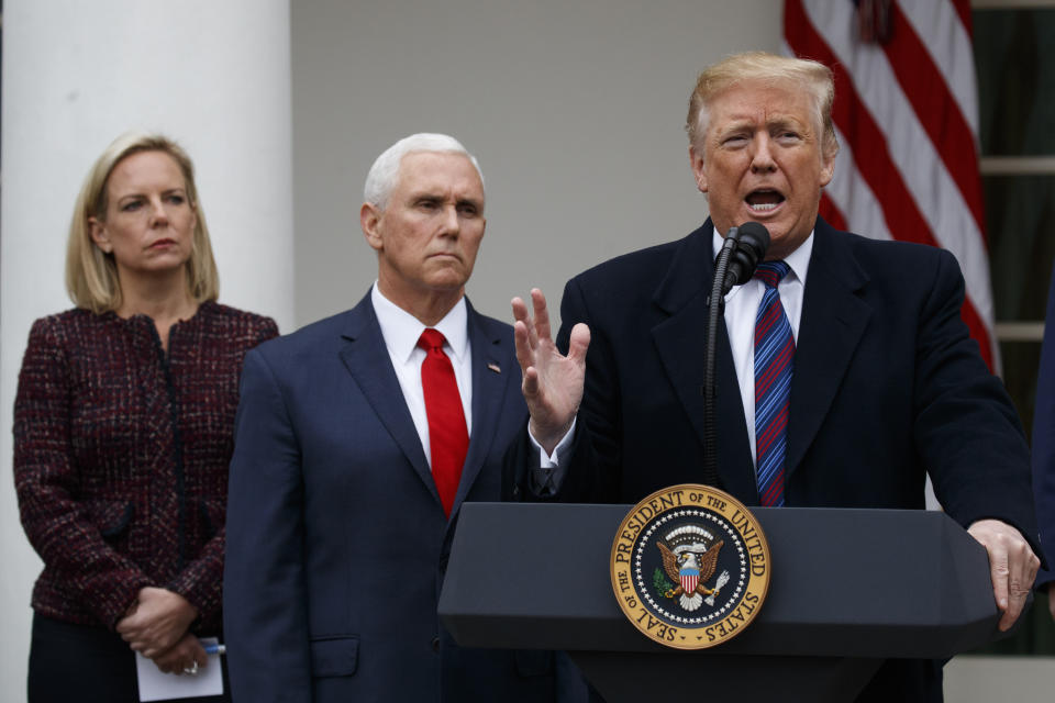 President Donald Trump speaks during a news conference in the Rose Garden of the White House after meeting with lawmakers about border security, Friday, Jan. 4, 2019, in Washington, Secretary of Homeland Security Kirstjen Nielsen and Vice President Mike Pence listen. (AP Photo/Manuel Balce Ceneta)