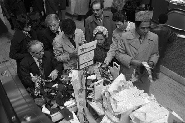 People shopping at Macy's department store in the Christmas season (Photo by Fairchild Archive/Penske Media via Getty Images)