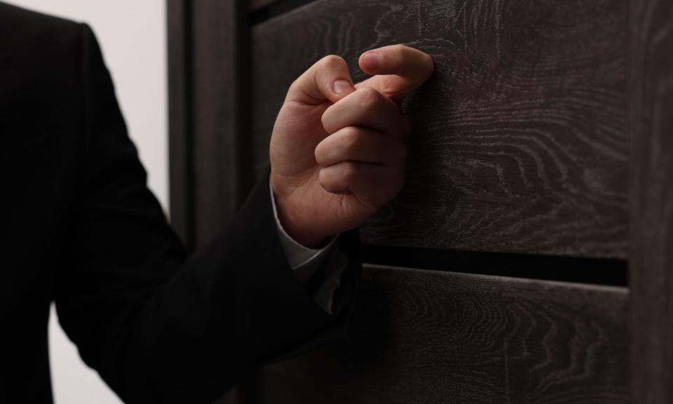<span>Unregulated identity tracers have been tasked with finding the right door to knock on to get a debtor to pay up.</span><span>Photograph: Olga Yastremska/Alamy</span>