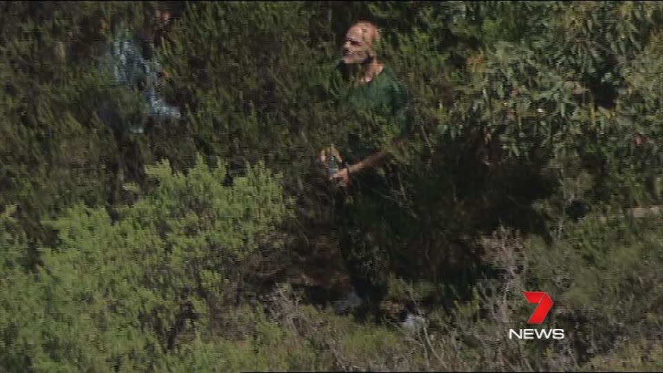 Tarantino helping police search for the missing 12-year-old's body.Photo: 7 News