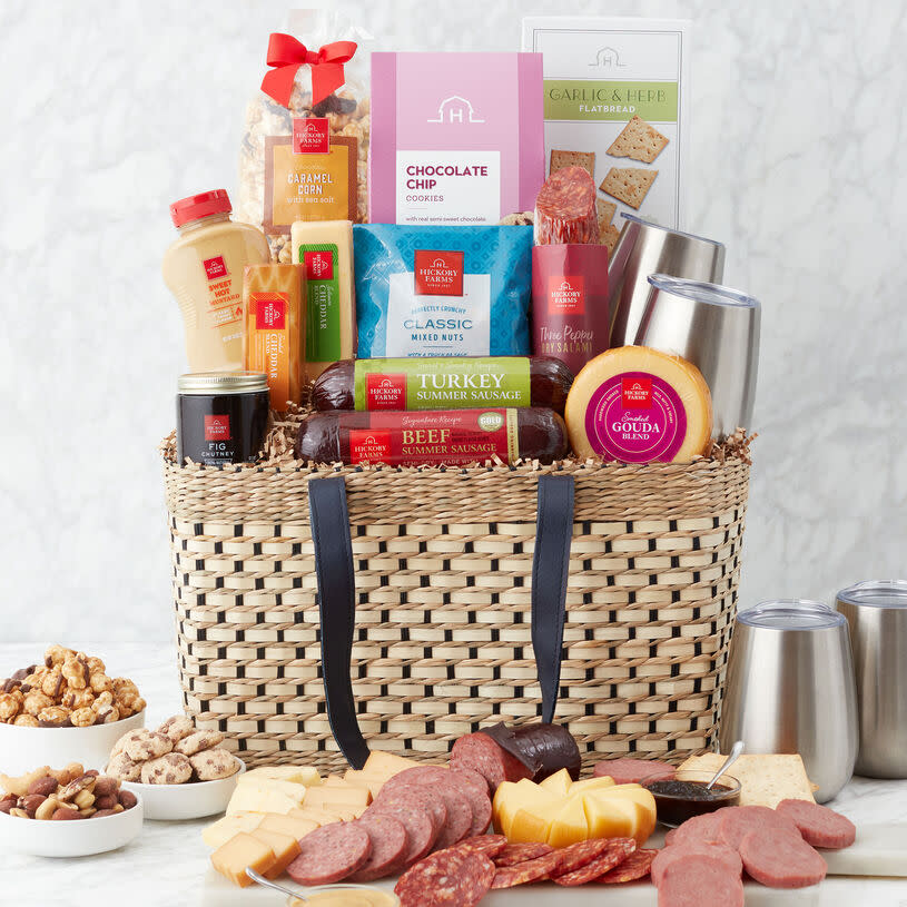 <p><a href="https://go.redirectingat.com?id=74968X1596630&url=https%3A%2F%2Fwww.hickoryfarms.com%2Fgift-baskets%2Fpicnic%2Fdeluxe-gourmet-picnic-gift-basket-006547.html%3Fgridindex%3D2%26cgid%3Dpicnic-gift-baskets%23prefn1%3DrefinementsCheese1%26prefv1%3D2%26srule%3DPrice-high-low%26start%3D1%26sz%3D24%26position%3D1%26source%3Dpdp&sref=https%3A%2F%2Fwww.thepioneerwoman.com%2Fholidays-celebrations%2Fgifts%2Fg35813172%2Fmothers-day-basket-ideas%2F" rel="nofollow noopener" target="_blank" data-ylk="slk:Shop Now;elm:context_link;itc:0;sec:content-canvas" class="link ">Shop Now</a></p><p>Deluxe Gourmet Picnic Gift Basket</p><p>hickoryfarms.com</p><p>$110.00</p><span class="copyright">Hickory Farms </span>