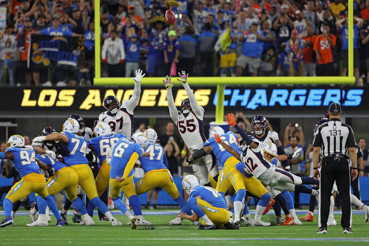 Injured Hopkins kicks OT game-winner as Chargers beat stumbling