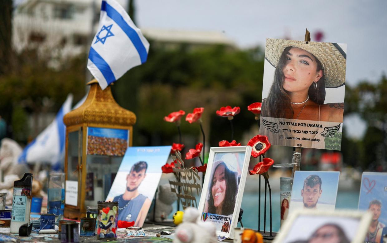 Memorabilia and pictures of the hostages kidnapped in the deadly October 7 attack on Israel by the Palestinian Islamist group Hamas from Gaza, are displayed at Dizengoff Square in Tel Aviv, Israel March 27, 2024. REUTERS/Hannah McKay