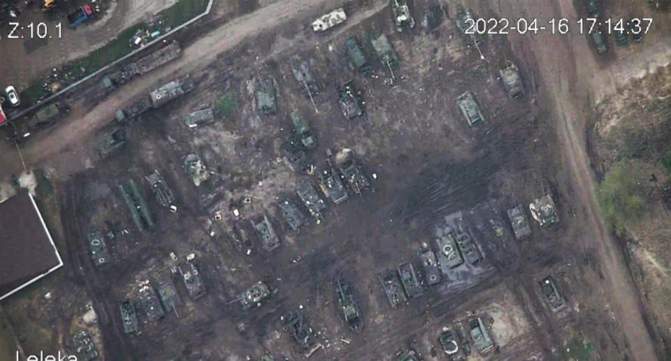 Broken Russian tanks in field at at Golovchino village Russia.