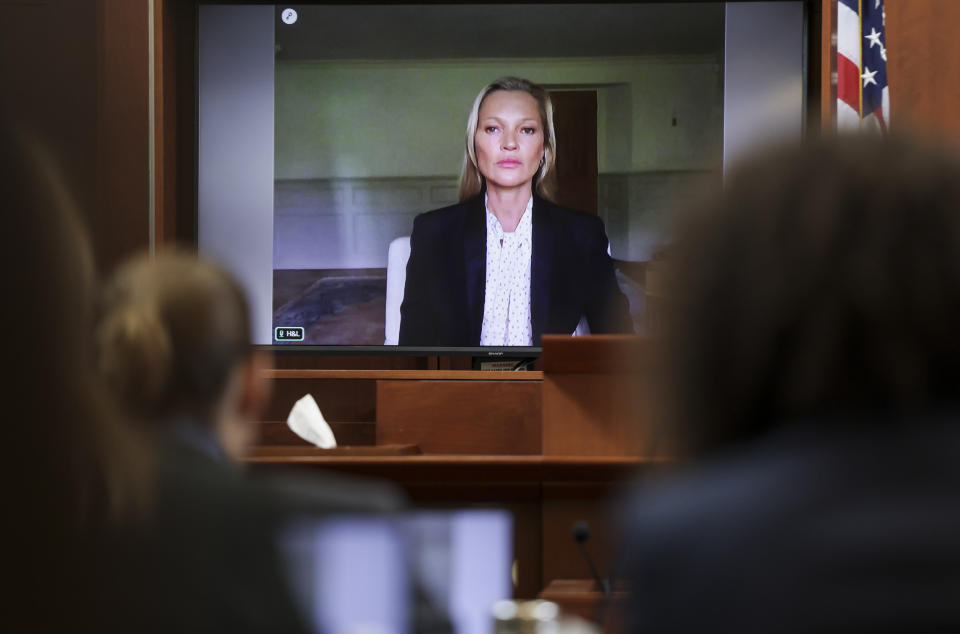 Model Kate Moss, a former girlfriend of actor Johnny Depp, testifies via video link at the Fairfax County Circuit Courthouse in Fairfax, Va., Wednesday, May 25, 2022. Depp sued his ex-wife Amber Heard for libel in Fairfax County Circuit Court after she wrote an op-ed piece in The Washington Post in 2018 referring to herself as a "public figure representing domestic abuse." (Evelyn Hockstein/Pool photo via AP)