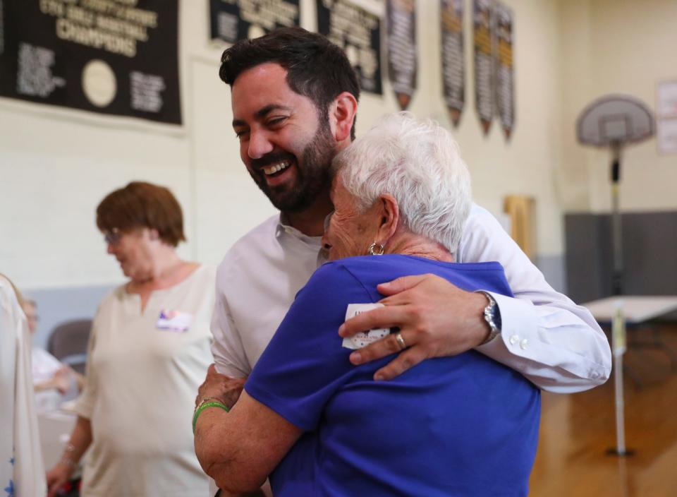 New York Assemblyman Mike Lawler is greeted by a constituent after casting his ballot in the primary election at the Church of St. Aedan in Pearl River on Tuesday, August 23, 2022.
