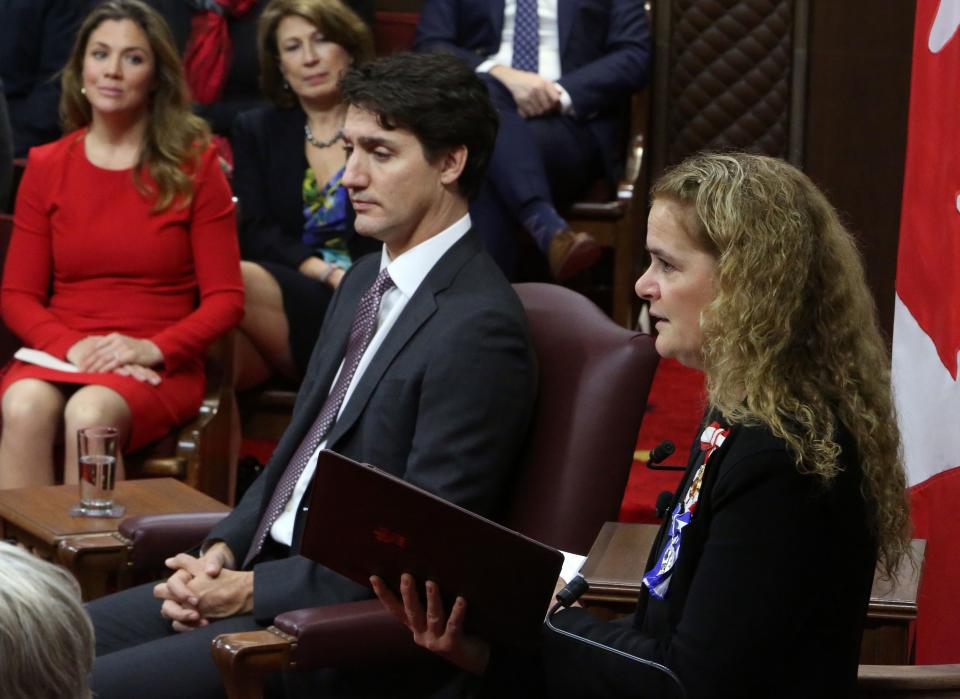 Sophie Gregoire and Prime Minister Justin Trudeau (C) look on as Governor General Julie Payette (L) delivers the Throne Speech in the Senate chamber on December 5, 2019 in Ottawa. (Photo by Fred Chartrand / POOL / AFP) (Photo by FRED CHARTRAND/POOL/AFP via Getty Images)