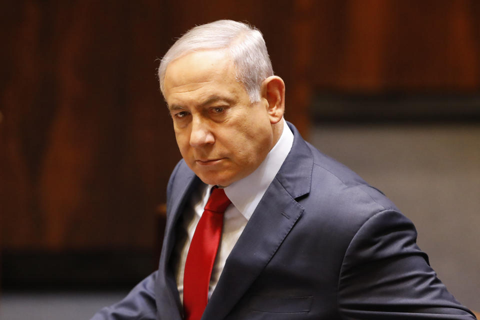 Israeli Prime Minister Benjamin Netanyahu before voting in the Knesset, Israel's parliament in Jerusalem, Wednesday, May 29, 2019. Israel's parliament has voted to dissolve itself, sending the country to an unprecedented second snap election this year as Prime Minister Benjamin Netanyahu failed to form a governing coalition before a midnight deadline. (AP Photo/Sebastian Scheiner)