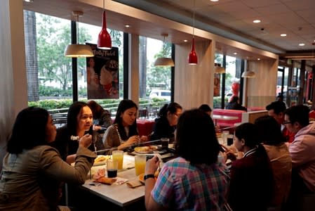 Customers dine at a Jollibee branch in Pasig City