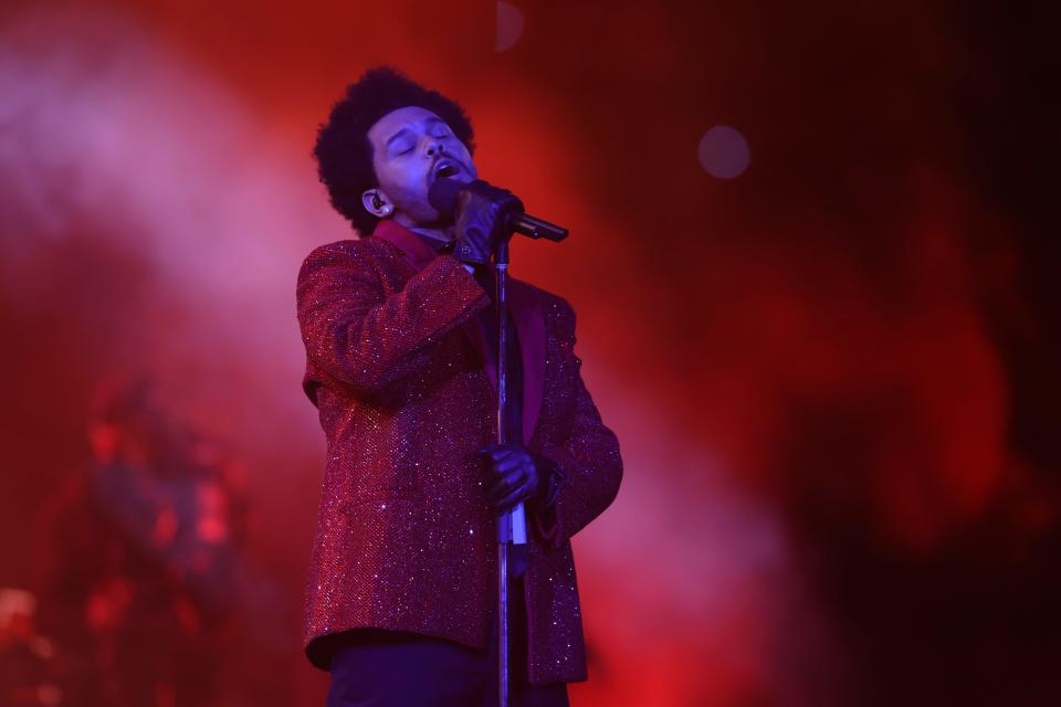 The Weeknd, seen here performing during the halftime show at Super Bowl LV at Raymond James Stadium in 2021, will return to the stadium on Aug. 4 for a concert.