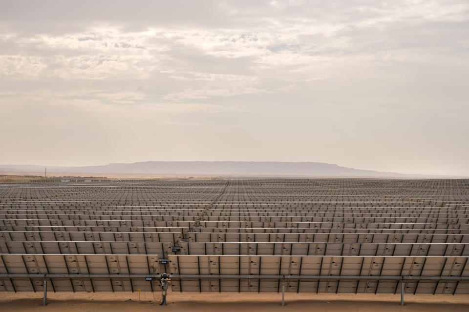 Thousands of photovoltaic solar panels generate electricity at Benban Solar Park, one of the world's largest solar power plant in the world, in Aswan, Egypt, Oct. 19, 2022. The Arab world’s most populous country is taking steps to convert to renewable energy. But the developing country, like others, faces obstacles in making the switch. (AP Photo/Amr Nabil)