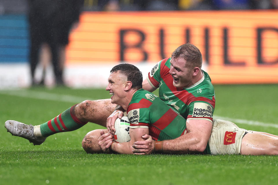 SYDNEY, AUSTRALIA - JULY 04: Jack Wighton of the Rabbitohs (L) scores a try during the round 18 NRL match between Parramatta Eels and South Sydney Rabbitohs at CommBank Stadium, on July 04, 2024, in Sydney, Australia. (Photo by Cameron Spencer/Getty Images)