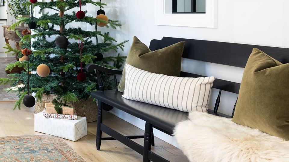 a living room with a christmas tree