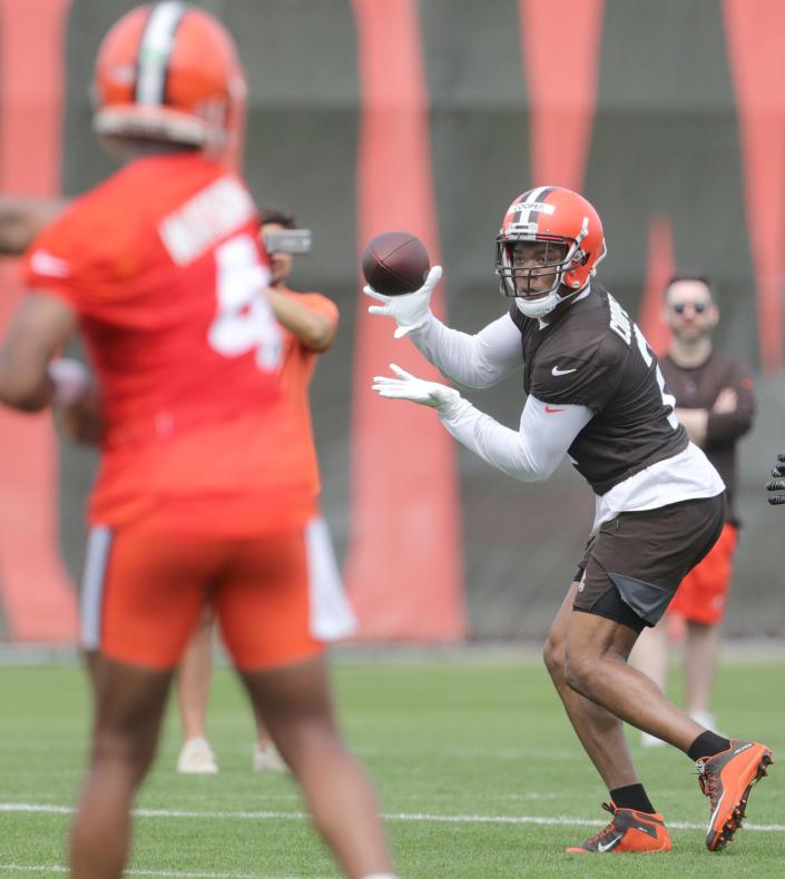 Cleveland Browns quarterback Deshaun Watson throws a touchdown pass to Amari Cooper during OTA practice on Wednesday, May 25, 2022 in Berea.