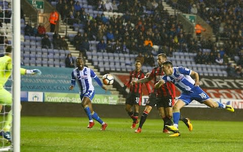 Gary Roberts goes close with a header - Credit: GETTY IMAGES