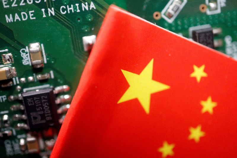 FILE PHOTO: Illustration picture of Chinese flag with semiconductor chips