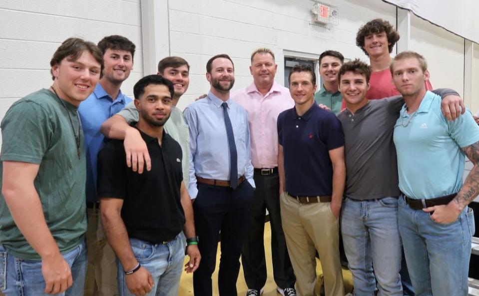 Blaze Bell, J. Henry Hobson, Andrew Fernandez, Cole Smith, Ryon Lindsey, Chase Coleraine, Jonah Wichmon, Cameron Brady, Garner Anderson, and Zac Rice posed for a photo with The Rocket, Roger Clemons, during the Night with The Rocket event at the Meridian Baptist Church in south Jackson, Tennessee on Thursday, April 13, 2023. The 4th annual event, which benefits the Trey Lindsey Scholarship Fund at the University of Tennessee at Martin, featured Roger Clemens as the special guest. Clemens, a pitcher with 354 wins and 4,672 strikeouts, is a 7 Cy Young Award winner whose career spanned 24 years with the Red Sox, Yankees, Blue Jays, & Astros. He was a 11X All-Star and won two World Series with the Yankees. The event consisted of a buffet dinner, silent auction with sports/celebrity memorabilia and hunting, vacation, and restaurant packages.  Trey Lindsey suddenly passed away on July 12, 2016 after graduating from the University of Tennessee at Martin with a degree in wildlife biology. Trey's father, John Lindsey, established the scholarship in his memory for students majoring in wildlife biology at the university.