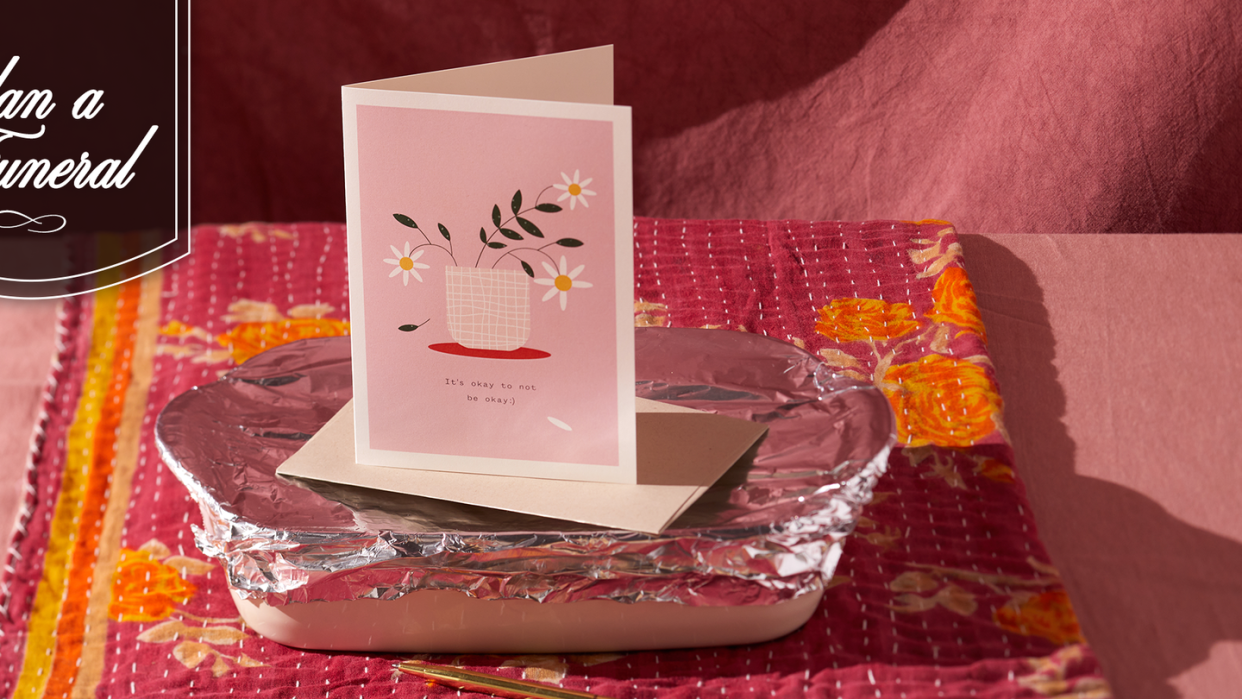 sympathy card on top of casserole dish with foil