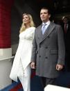 <p>Ivanka chose a bright white look by Oscar de la Renta for her father’s inauguration in the form of a tailored asymmetric jacket and slim-fitting trousers. <i>[Photo: Getty]</i> </p>