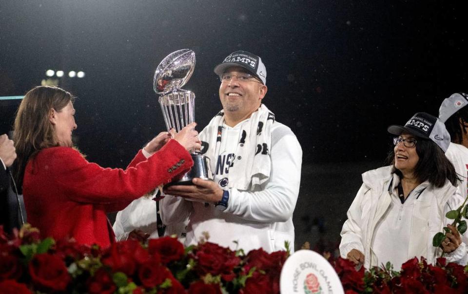 Penn State football coach James Franklin is presented the Rose Bowl Leishman Trophy after 35-21 win over Utah on Monday, Jan. 2, 2023.