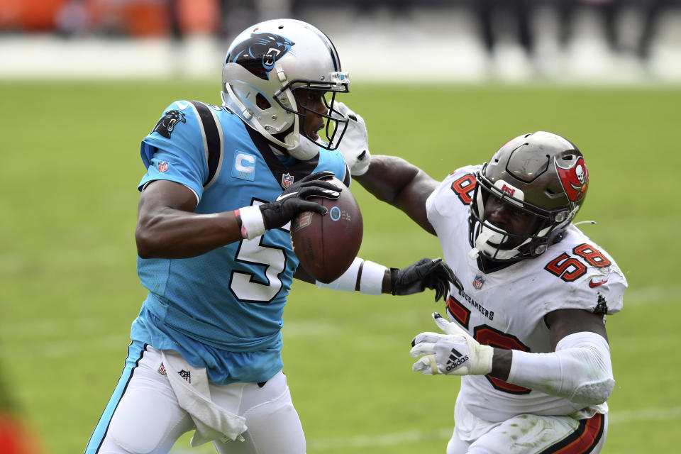 Tampa Bay Buccaneers linebacker Shaquil Barrett (58) chases Carolina Panthers quarterback Teddy Bridgewater (5) during the second half of an NFL football game Sunday, Sept. 20, 2020, in Tampa, Fla. (AP Photo/Jason Behnken)