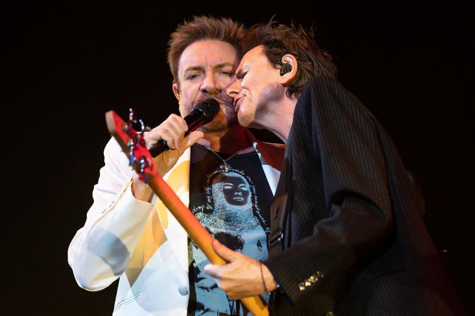 Simon Le Bon (left) and John Taylor of Duran Duran perform during the Future Past North American Tour at Little Caesars Arena in Detroit on Saturday, Sept. 16, 2023.