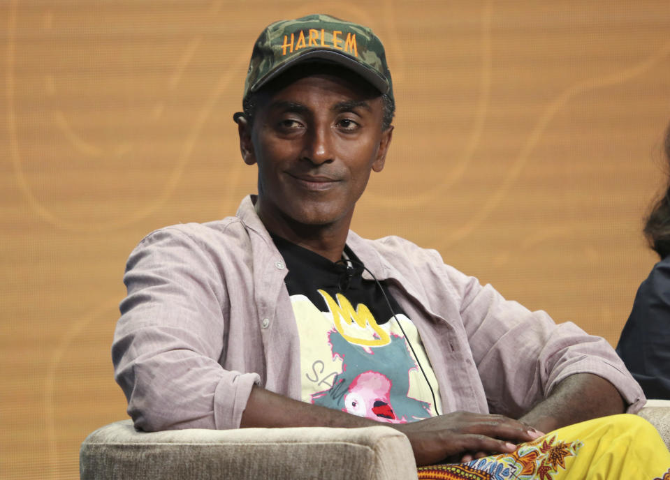 FILE - Host/chef Marcus Samuelsson participates in PBS's "No Passport Required" and "South By Somewhere" panel at the Television Critics Association Summer Press Tour in Beverly Hills, Calif. on July 30, 2019. Samuelsson is hoping to educate Americans and champion Black chefs in “The Rise: Black Cooks and the Soul of American Food” from Little, Brown and Company's Voracious imprint. The book has 150 recipes from two dozen top Black chefs and includes profiles of each. (Photo by Willy Sanjuan/Invision/AP, File)