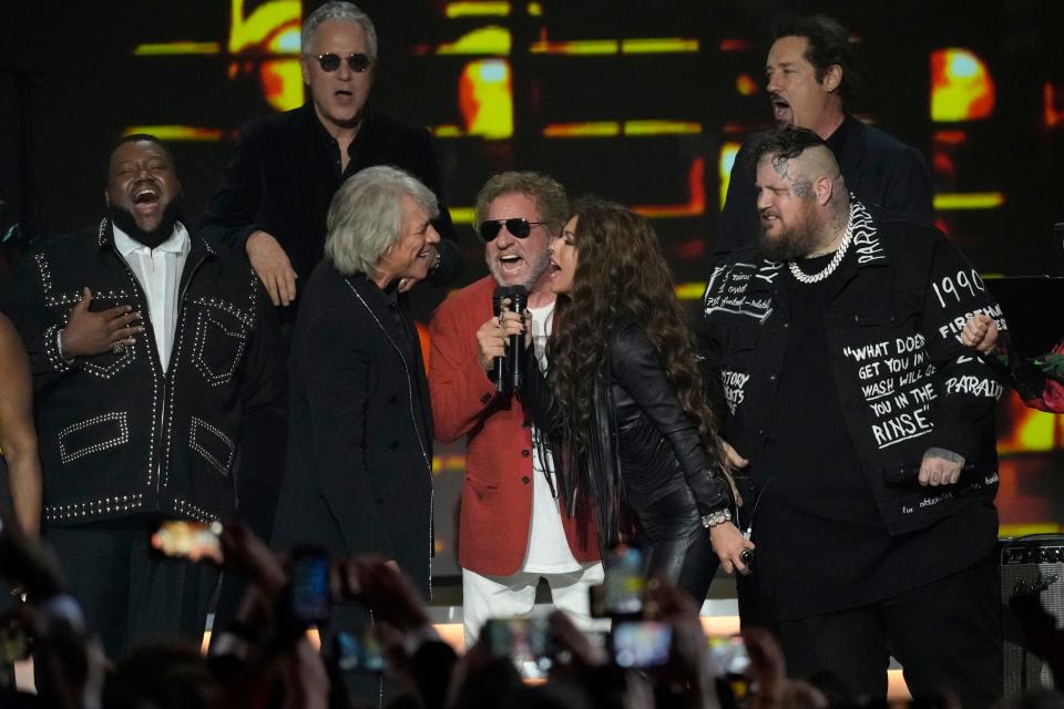 Michael Trotter Jr. (left to right) of The War and Treaty, Hugh McDonald, Jon Bon Jovi, Sammy Hagar, Shania Twain John Shanks and Jelly Roll wrapped the 2024 MusiCares Person of the Year gala with a rollicking singalong of "Livin' On a Prayer."