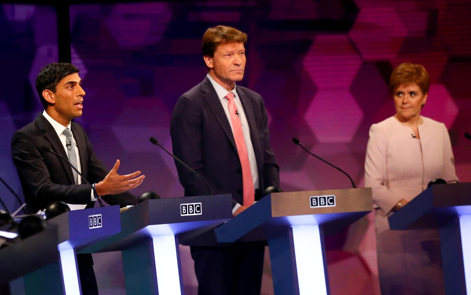 Conservatives' Chief Secretary to the Treasury Rishi Sunak (L), Brexit Party chairman Richard Tice (C) and SNP leader and Scottish First Minister Nicola Sturgeon participate in a general election debate in Cardiff, Wales on November 29, 2019. - Britain will go to the polls on December 12, 2019 to vote in a pre-Christmas general election. (Photo by HANNAH MCKAY / POOL / AFP) (Photo by HANNAH MCKAY/POOL/AFP via Getty Images)
