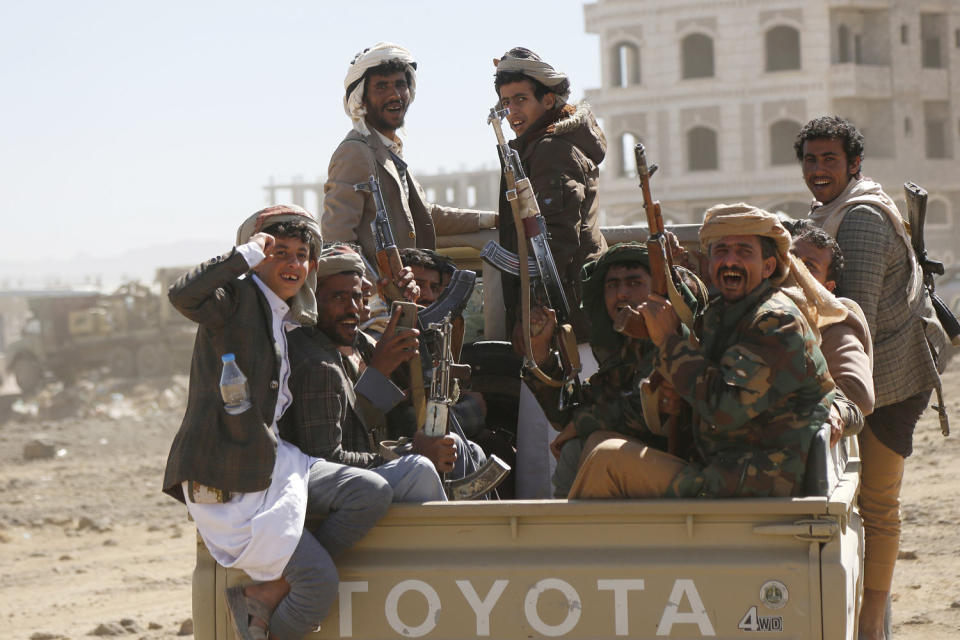 Houthi fighters and tribesmen stage a rally against the U.S. and the U.K. strikes on Houthi-run military sites near Sanaa, Yemen, on Sunday, Jan. 14, 2024. (AP)