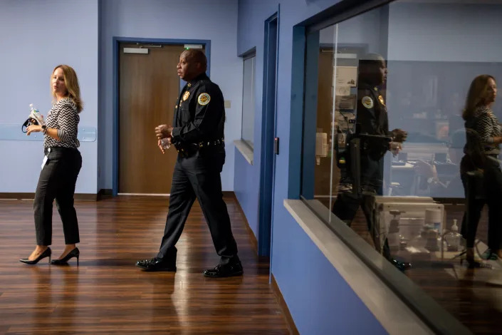 Amanda Bracht, the senior vice president of clinical services at Mental Health Cooperative, leads Nashville Police Chief John Drake on a tour of the Mental Health Cooperative facility on Monday, June 7, 2021, in Nashville, Tenn.