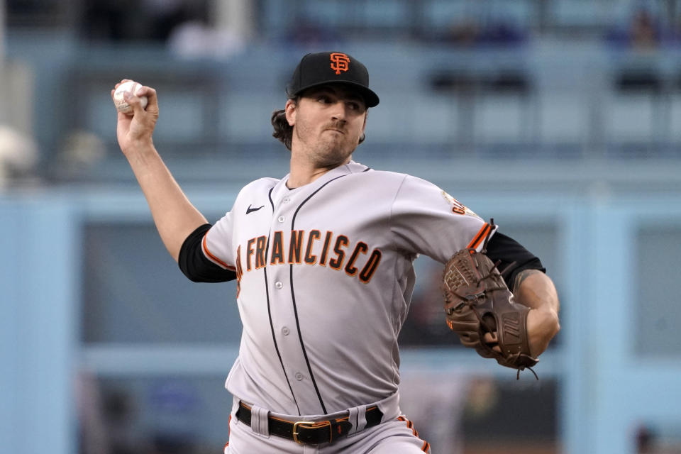 San Francisco Giants starting pitcher Kevin Gausman throws to the plate during the first inning of a baseball game against the Los Angeles Dodgers Tuesday, June 29, 2021, in Los Angeles. (AP Photo/Mark J. Terrill)