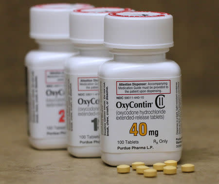 FILE PHOTO: Bottles of prescription painkiller OxyContin pills, made by Purdue Pharma LP sit on a counter at a local pharmacy in Provo, Utah, U.S., April 25, 2017. REUTERS/George Frey/File Photo