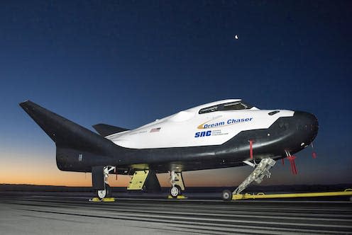 <span class="caption">Dream Chaser would ferry cargo, and eventually crew, to low-Earth orbit.</span> <span class="attribution"><a class="link " href="https://images.nasa.gov/details/AFRC2017-0124-015" rel="nofollow noopener" target="_blank" data-ylk="slk:Ken Ulbrich / NASA;elm:context_link;itc:0;sec:content-canvas">Ken Ulbrich / NASA</a></span>