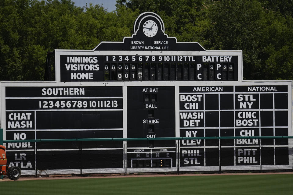 A manual scoreboard is seen at Rickwood Field, Monday, June 10, 2024, in Birmingham, Ala. Rickwood Field, known as one of the oldest professional ballpark in the United States and former home of the Birmingham Black Barons of the Negro Leagues, will be the site of a special regular season game between the St. Louis Cardinals and San Francisco Giants on June 20, 2024. (AP Photo/Brynn Anderson)