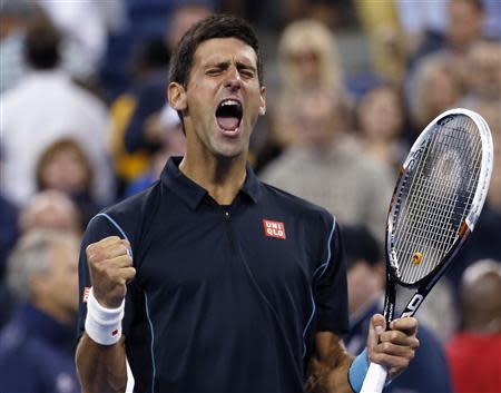 Novak Djokovic of Serbia celebrates defeating Mikhail Youzhny of Russia during their quarter-final match at the U.S. Open tennis championships in New York, September 5, 2013. REUTERS/Mike Segar