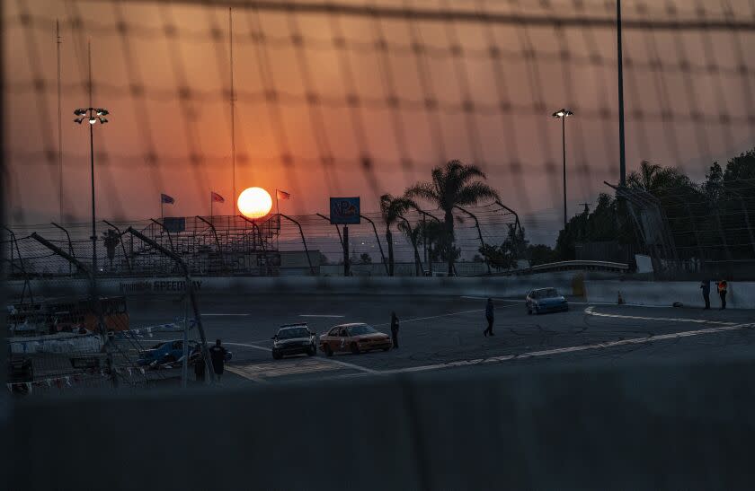 IRWINDALE, CA - JUNE 15, 2019: The sunsets behind the track during the "Summer Mayhem" event at the Irwindale Speedway on June 15, 2019 in Irwindale, California.(Gina Ferazzi/Los AngelesTimes)