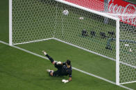 Portugal's goalkeeper Rui Patricio (1) looks back as a penalty kick by France's Karim Benzema goes into the net for a goal the Euro 2020 soccer championship group F match between Portugal and France at the Ferenc Puskas stadium in Budapest, Hungary, Wednesday, June 23, 2021. (AP Photo/Laszlo Balogh, Pool)