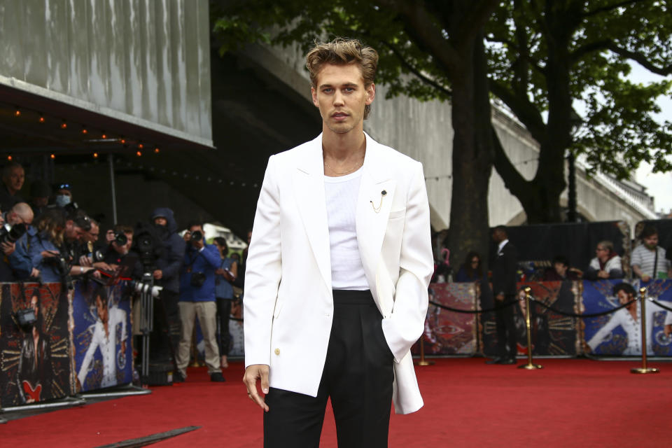 Austin Butler poses for photographers upon arrival for the premiere of the film 'Elvis' in London Tuesday, May 31, 2022. (Photo by Joel C Ryan/Invision/AP)