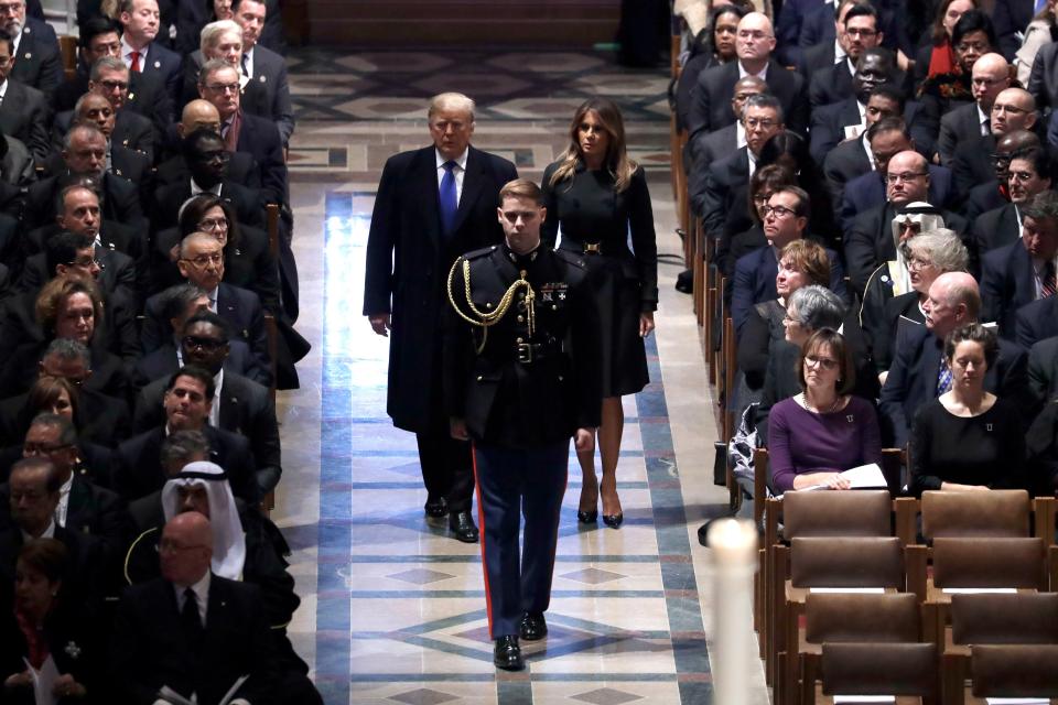 President Donald Trump and first lady Melania Trump arrive for the State Funeral former President George H.W. Bush, at the National Cathedral, in Washington on Dec. 5, 2018.