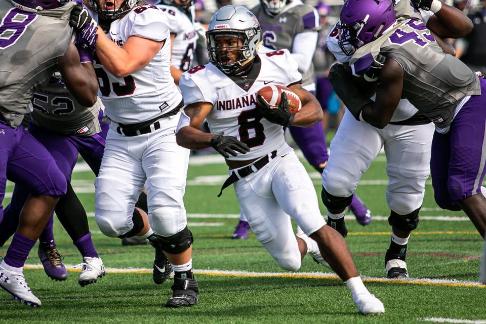 UIndy running back Toriano Clinto breaks through the defense.