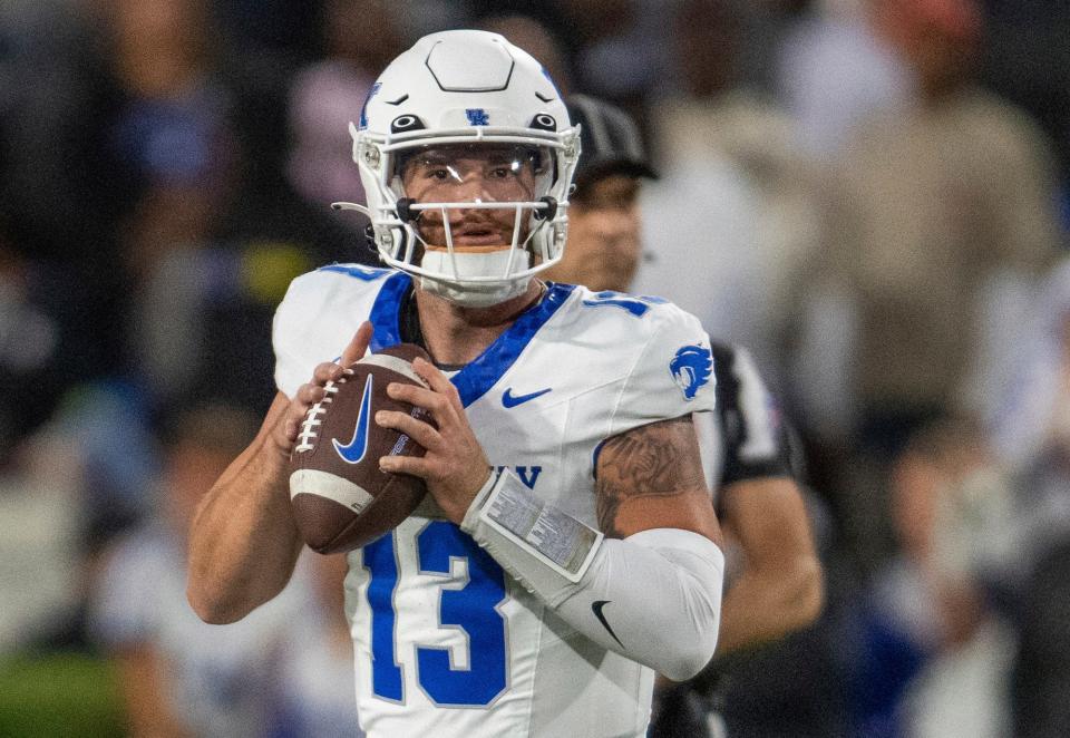 Kentucky quarterback Devin Leary looks to pass during the first half of the team's NCAA college football game agains Georgia, Saturday, Oct. 7, 2023, in Athens, Ga.