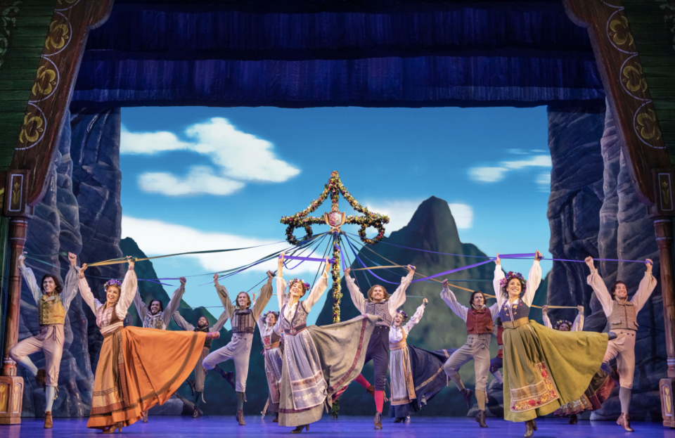 Company of Frozen, dancing in the stunning tailor-made Arendelle costumes. PHOTO: Disney Theatrical Productions and Base Entertainment Asia