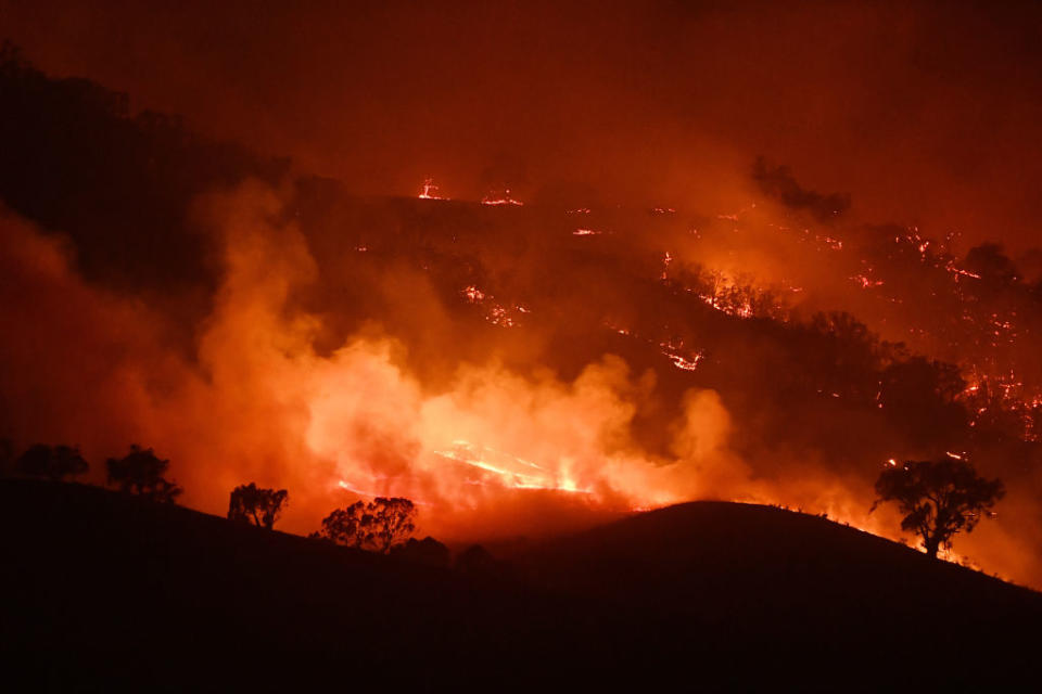 Flames engulf a hillside amid the Dunn Road fire at Mount Adrah, NSW.