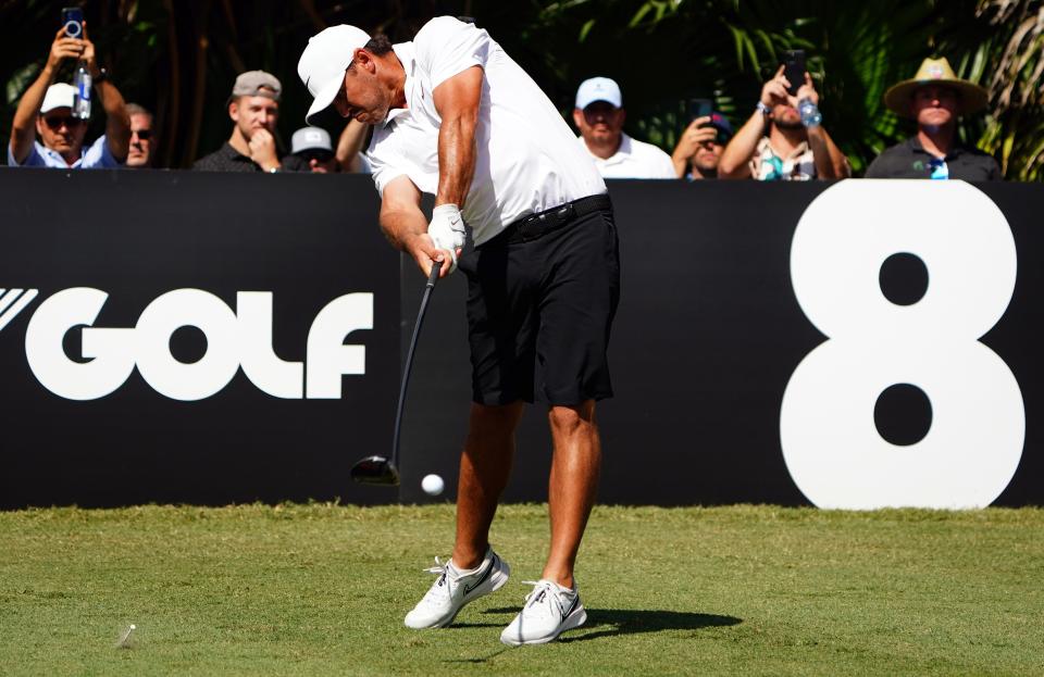 Brooks Koepka plays his tee shot off the eighth tee box during the first round of the season finale of the LIV Golf series at Trump National Doral.