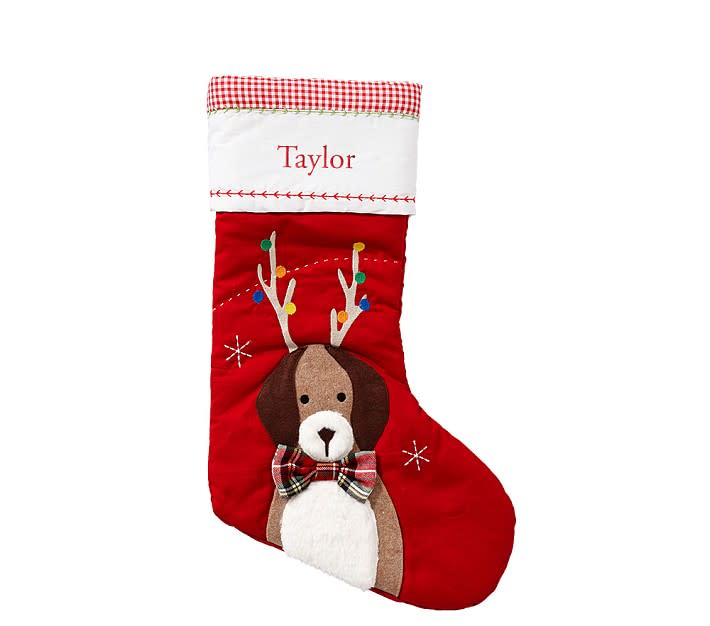 <p><a href="https://go.redirectingat.com?id=74968X1596630&url=https%3A%2F%2Fwww.potterybarnkids.com%2Fproducts%2Fdog-with-antlers-red-quilted-stocking%2F%3Fpkey%3Ds%257Edog%2Bstocking%257E15&sref=https%3A%2F%2Fwww.thepioneerwoman.com%2Fhome-lifestyle%2Fpets%2Fg37677370%2Fdog-christmas-stockings%2F" rel="nofollow noopener" target="_blank" data-ylk="slk:Shop Now;elm:context_link;itc:0;sec:content-canvas" class="link ">Shop Now</a></p><p>Dog With Antlers Red Quilted Christmas Stocking</p><p>potterybarnkids.com</p><p>$29.50</p><span class="copyright">Pottery Barn Kids</span>