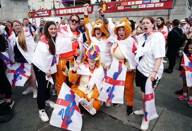 England fans dressed as lions at the celebration in Trafalgar Square
