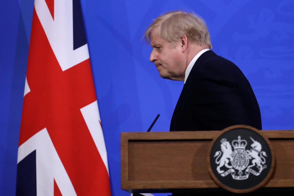 <p>The sheepish prime minister ends his news briefing with a hope and a prayer</p> (Getty)