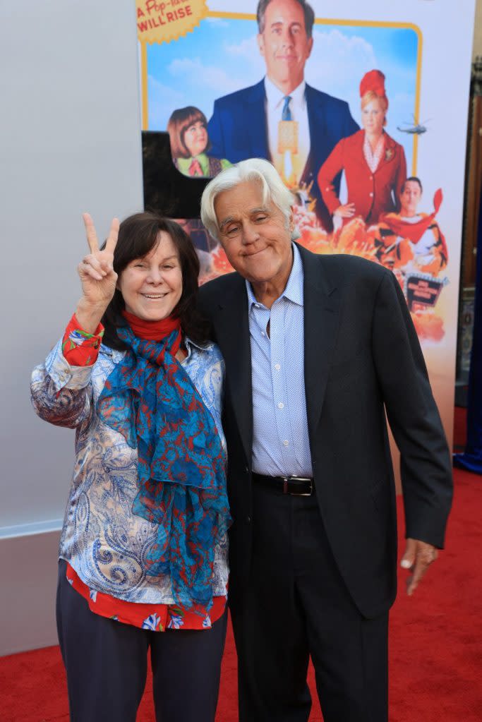 The pair beamed from ear to ear as they threw up peace signs on the red carpet. REUTERS